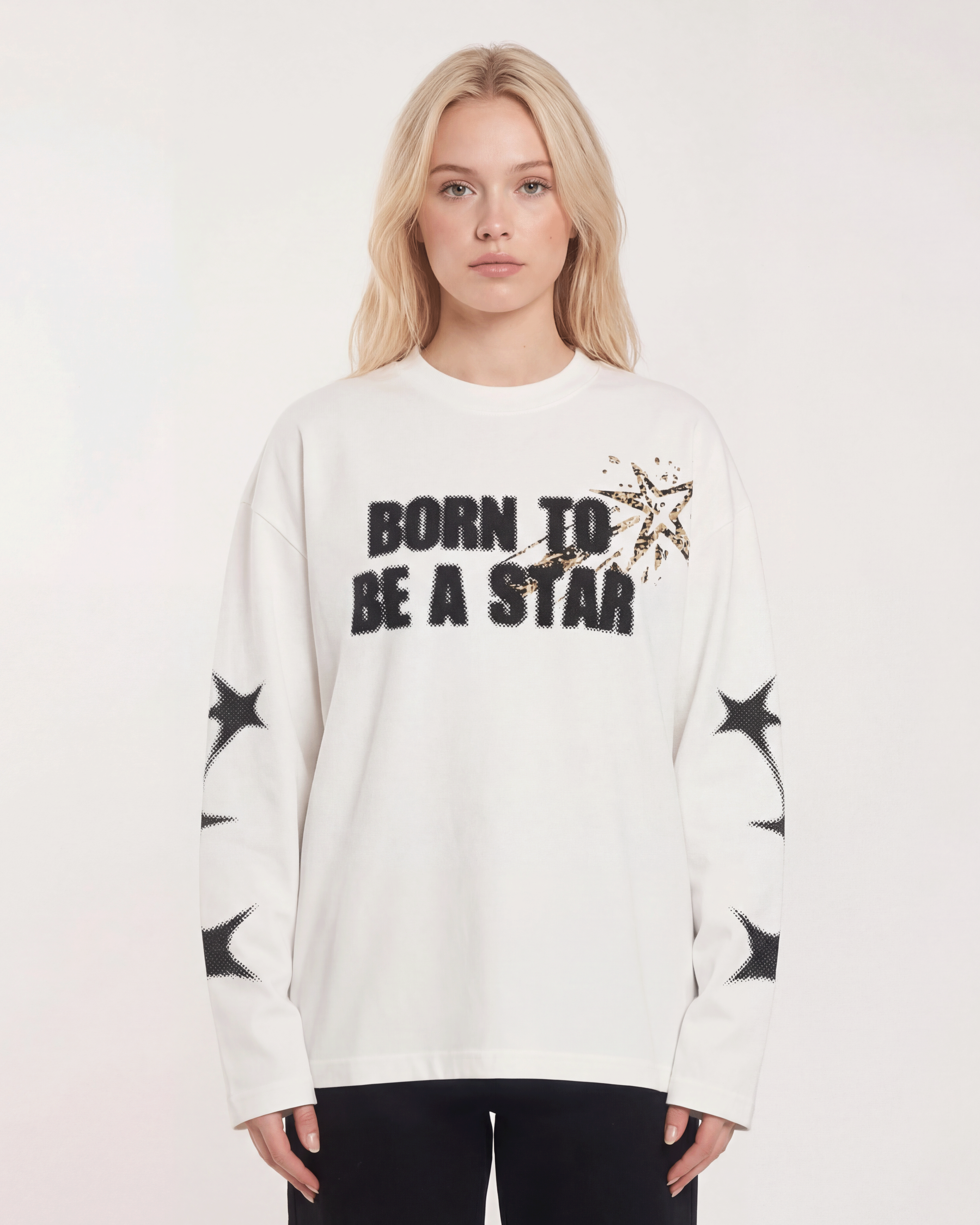 Model wearing white star print long sleeve shirt with born to be a star white