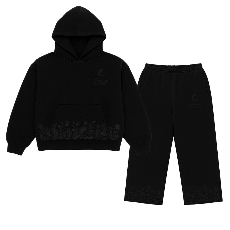 SHADOW BLOOM TRACKSUIT - Black Floral set featuring a unisex hoodie and pants with tonal floral embroidery on heavyweight cotton fabric.