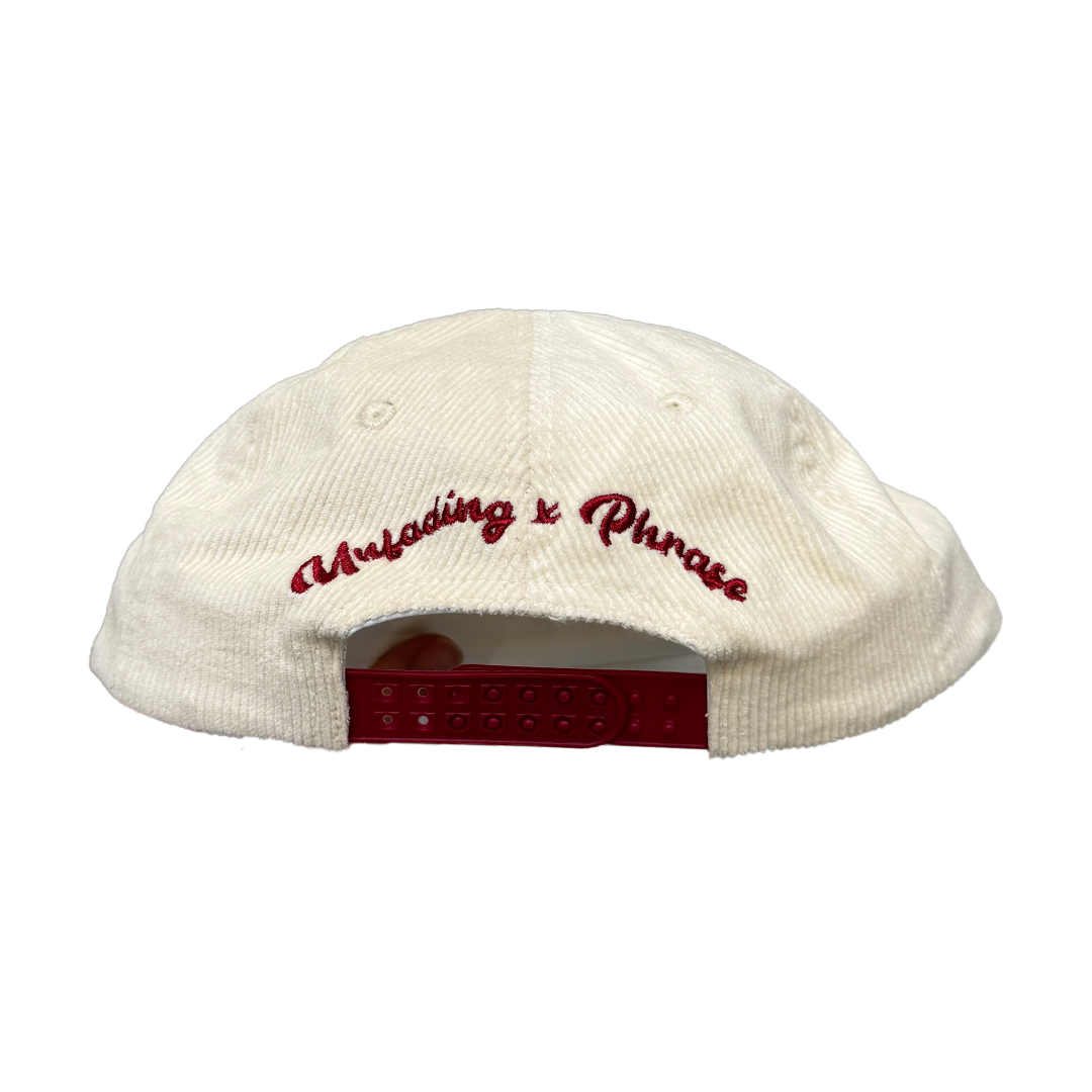 Back view of cream corduroy hat with embroidered logo